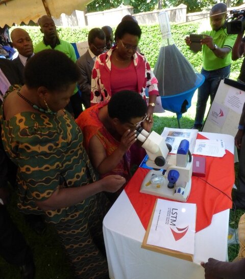 The Ugandan minister for Primary Health Care, the minister for Animal Husbandry and the minister for Northern Uganda, visiting the LSTM exhibition during the Tsetse Awareness day.  